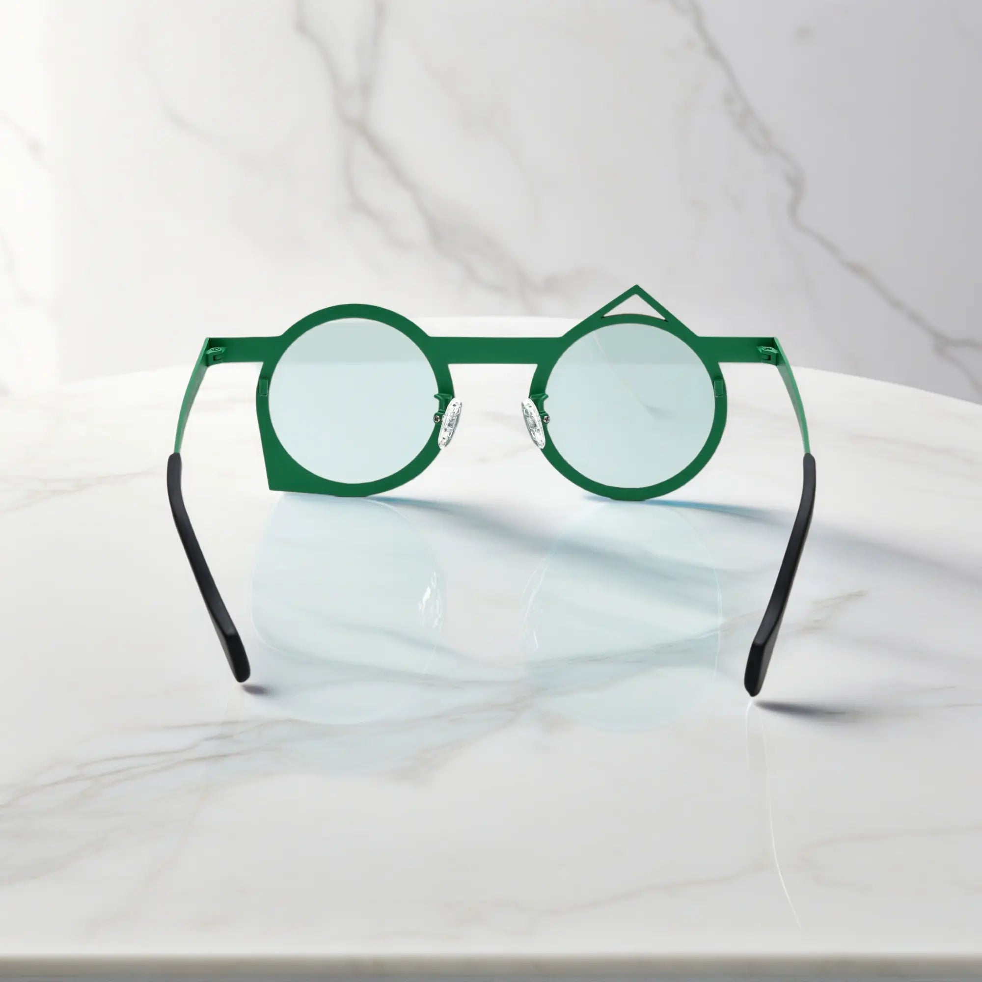 Rear angle of VoyueLens™ VL185801 Chili Emerald glasses with sleek titanium temples and vintage-inspired green-red dual-tone finish.